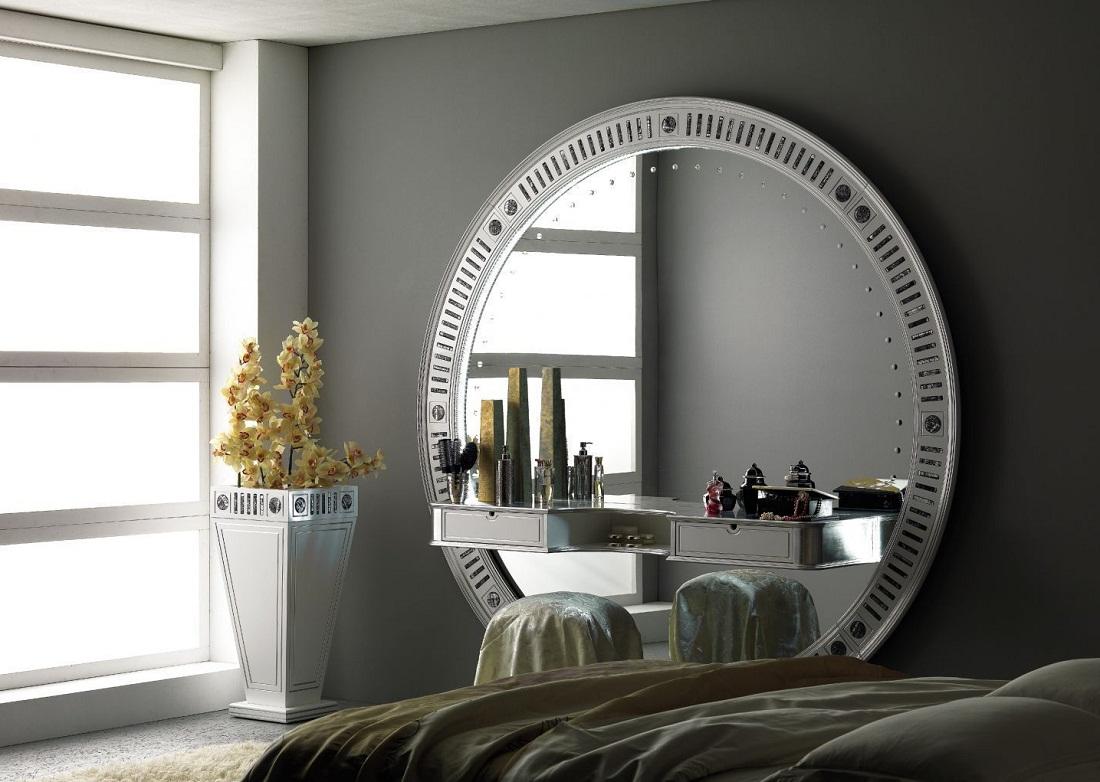 Для спальни, выполненной в стиле хай-тек, отлично подойдет объемное круглое зеркало 