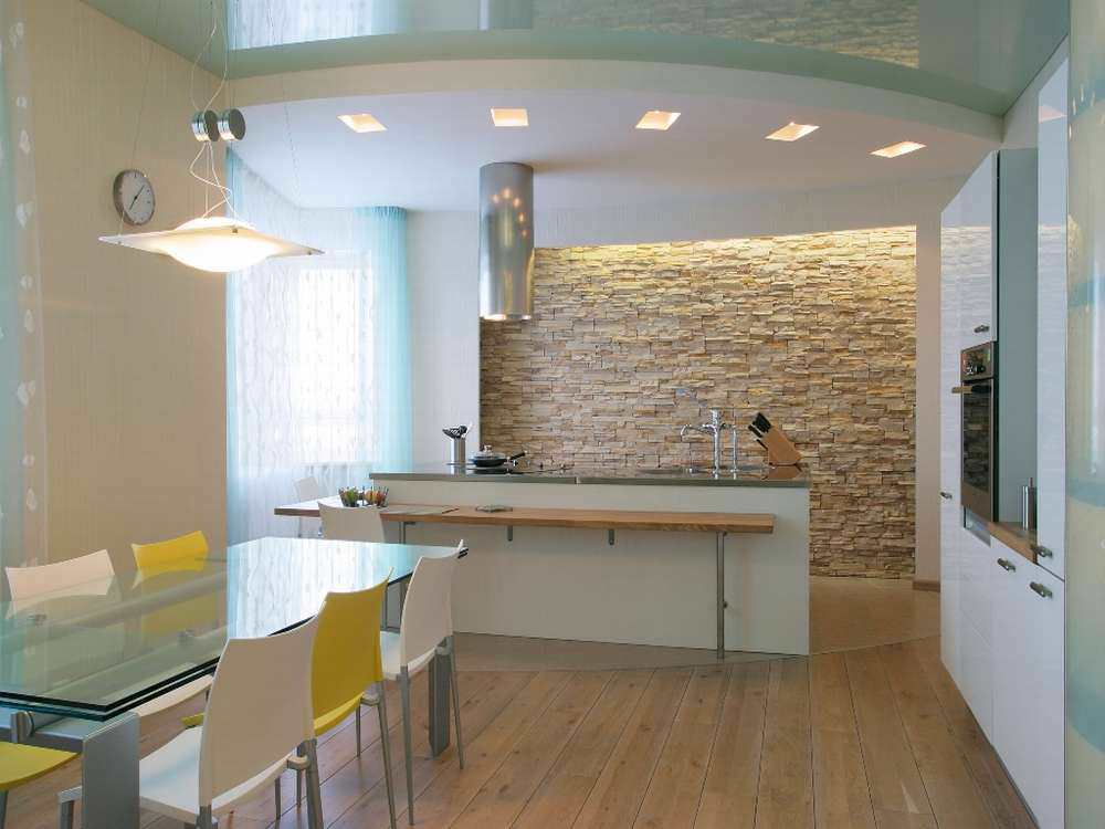 Камень на стене в интерьере кухни