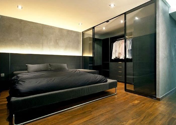Дизайн строгой мужской спальни в черных тонах