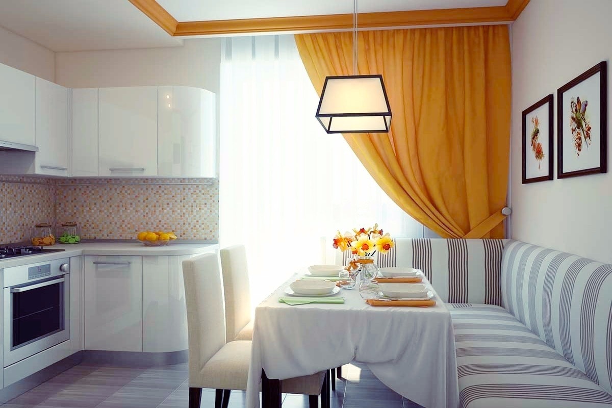 Спокойный и уютный интерьер кухни выполненный в светлых и оранжевых тонах