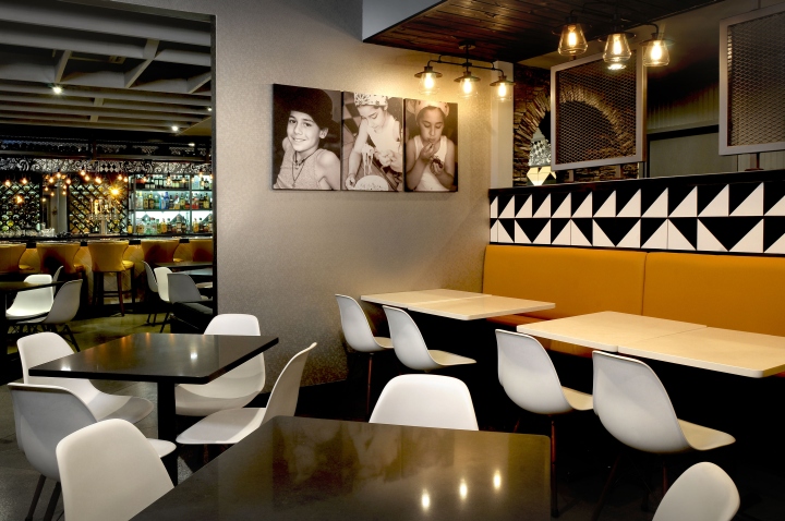 Интерьер ресторана Nico & Vali Italian в итальянском стиле: фото на стенах 