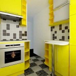 Сочетание желтого и черного цветов на кухне. Фото 16