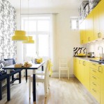 Сочетание желтого и черного цветов на кухне. Фото 13