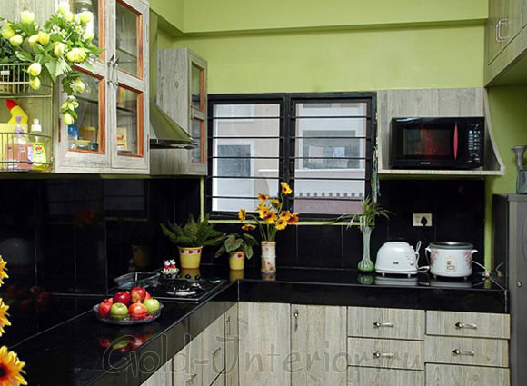 Чёрный и фисташковый цвет в декоре кухни