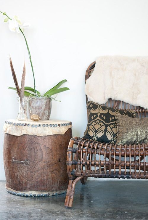 Filomena's Market - drum side table, wicker reed bamboo dark wood chair and dark throw pillows --- modern bohemian boho interior design / vintage and mod mix with nature, wood-tones and bright accent colors / anthropologie-inspired chic mid-century home decor