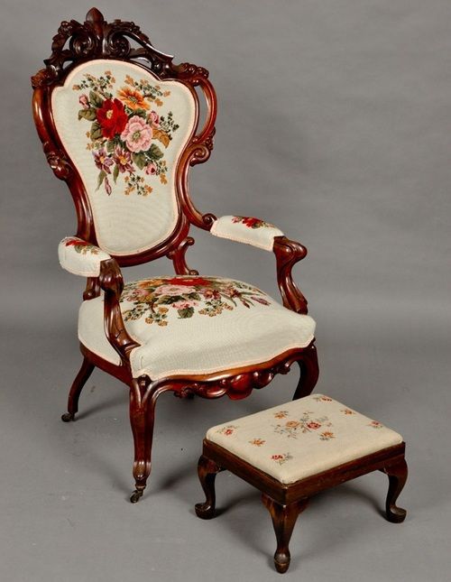 Heavily carved Rococo Revival needlepoint armchair with stool, mid 19th century.
