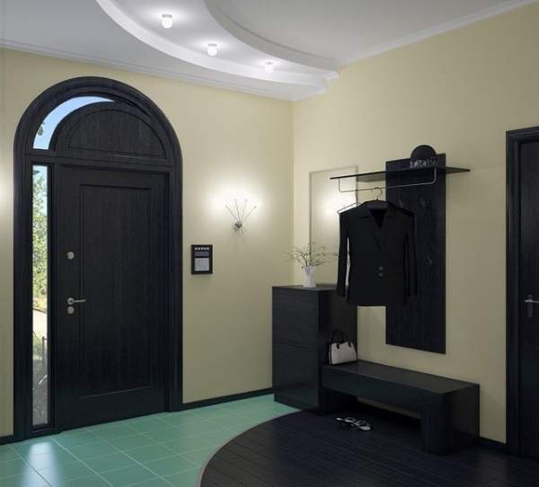 Черная мебель в современном дизайне прихожей в частном доме