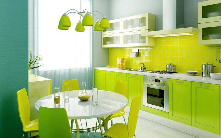 Свежий, насыщенный оттенок зеленого цвета - отличный выбор для оформления небольшой кухни.